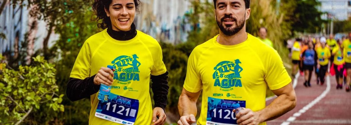 Two athletes participating in a marathon, showing determination and joy.